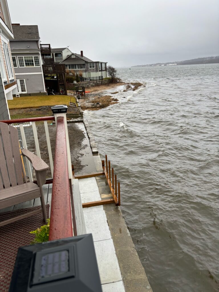a deck overlooking a body of water (MyCoast AI)