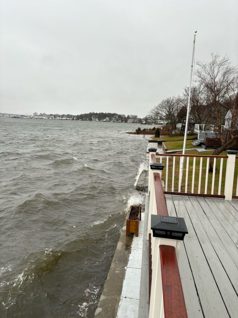 a dock with a boat in the water (MyCoast AI)