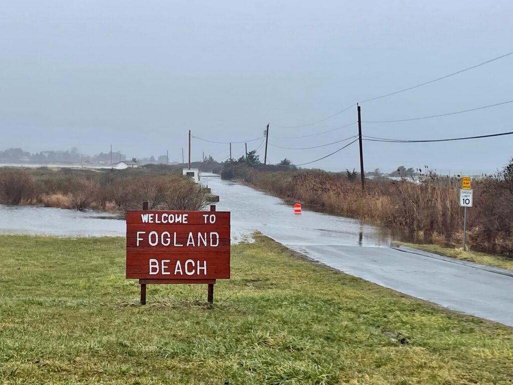 a sign on the side of a road (MyCoast AI)