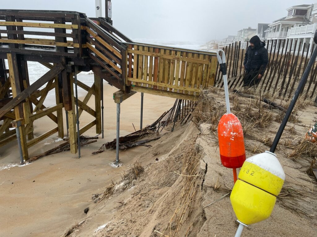 a person standing next to a construction site (MyCoast AI)