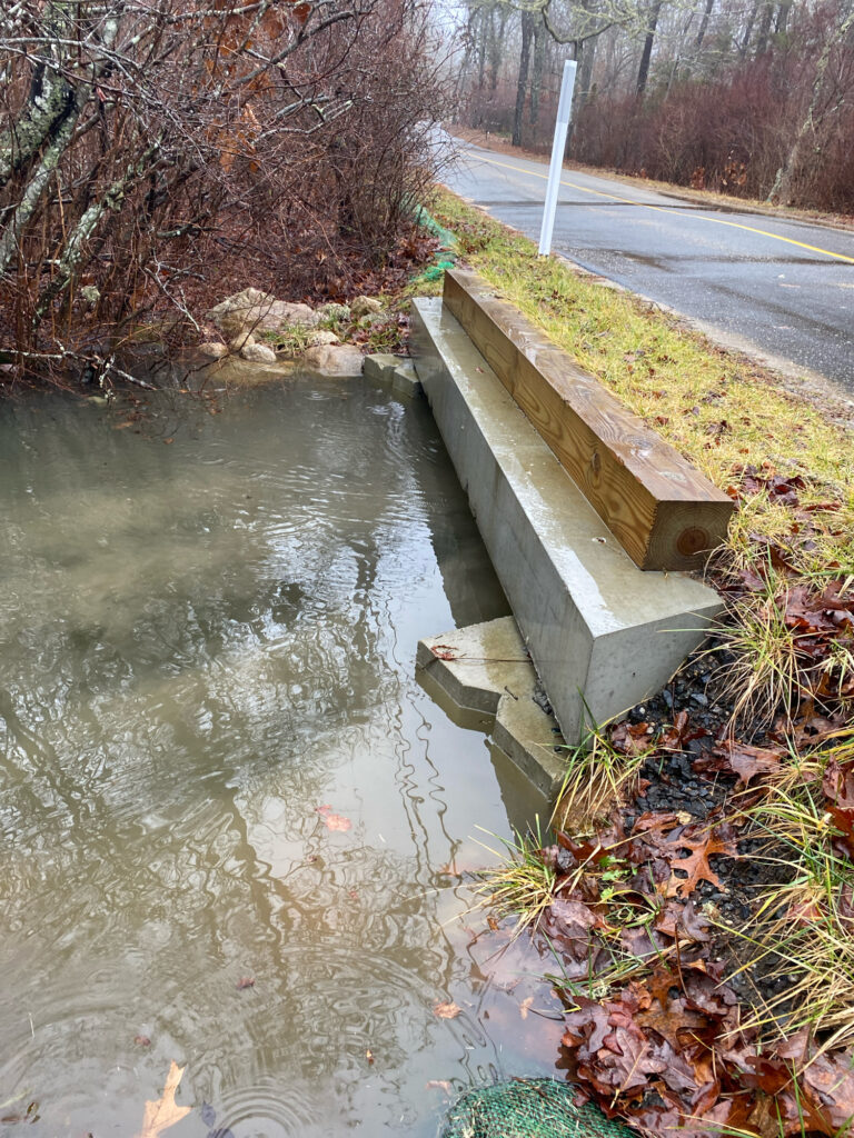 a bench next to a river (MyCoast AI)
