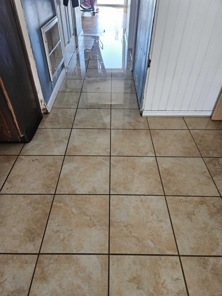 a tiled floor with a door (MyCoast AI)