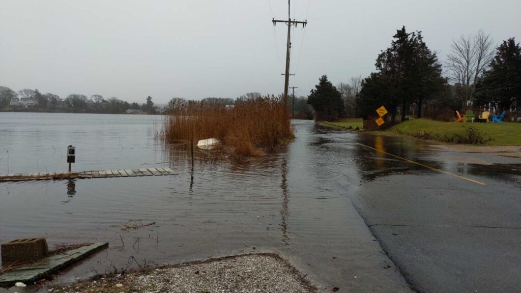 a flooded street with a power line (MyCoast AI)