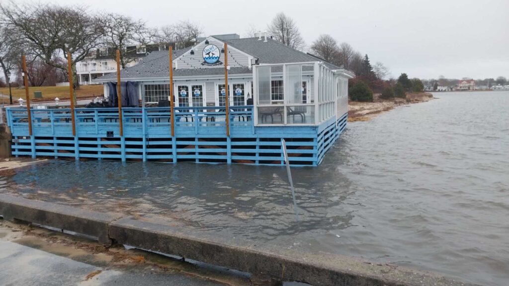 a flooded area with a building in the background (MyCoast AI)