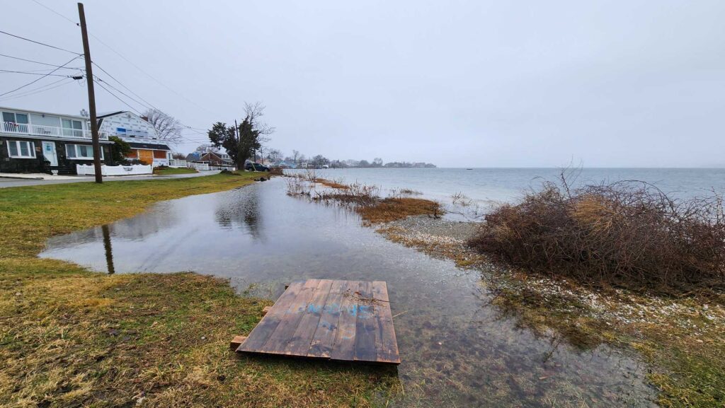 a wooden bench in a flooded area (MyCoast AI)