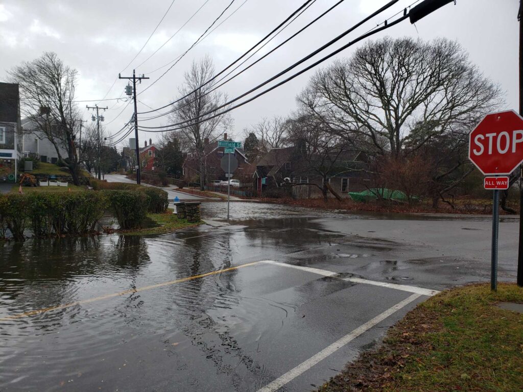 a flooded street with a stop sign (MyCoast AI)