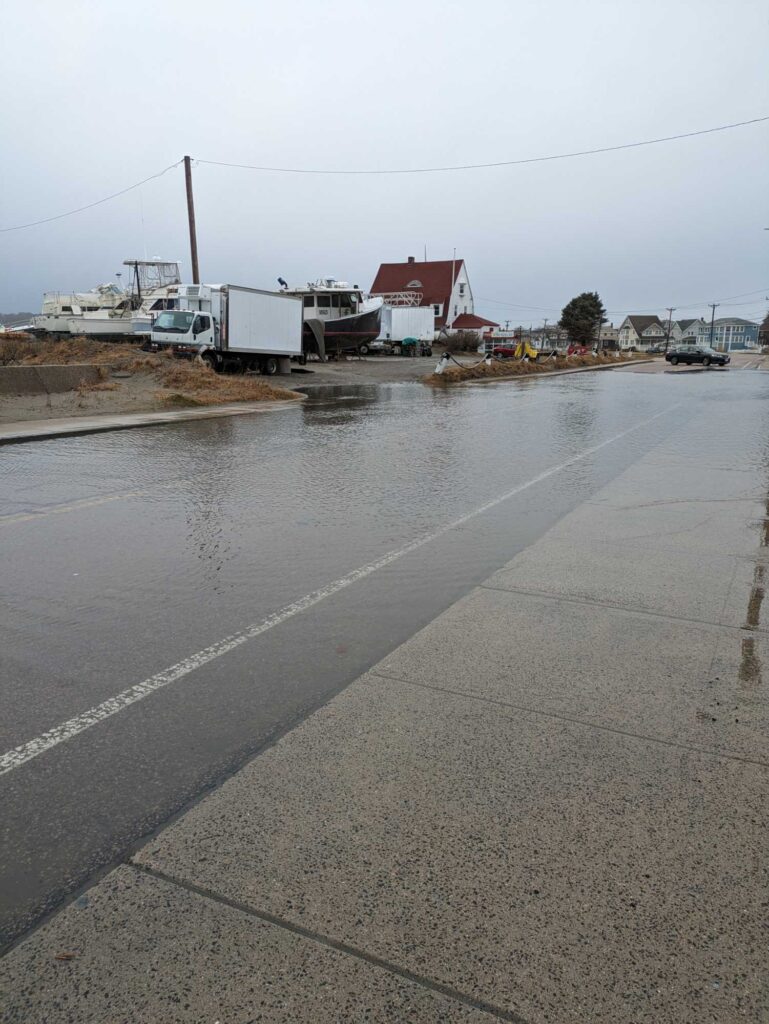 a road with a truck and a truck on it (MyCoast AI)
