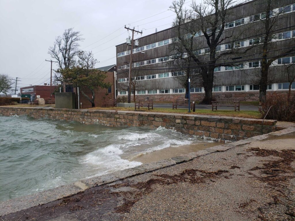 a river with a building in the background (MyCoast AI)
