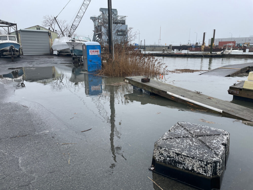 a flooded area with a few machines (MyCoast AI)