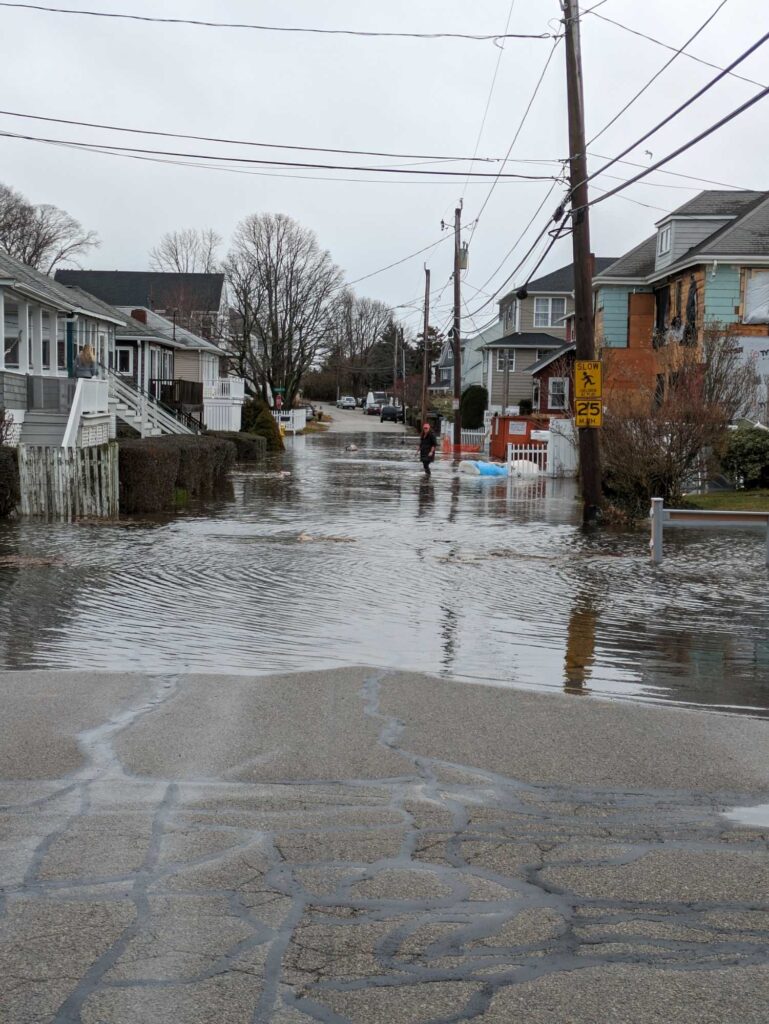 a person walking in a flooded street (MyCoast AI)