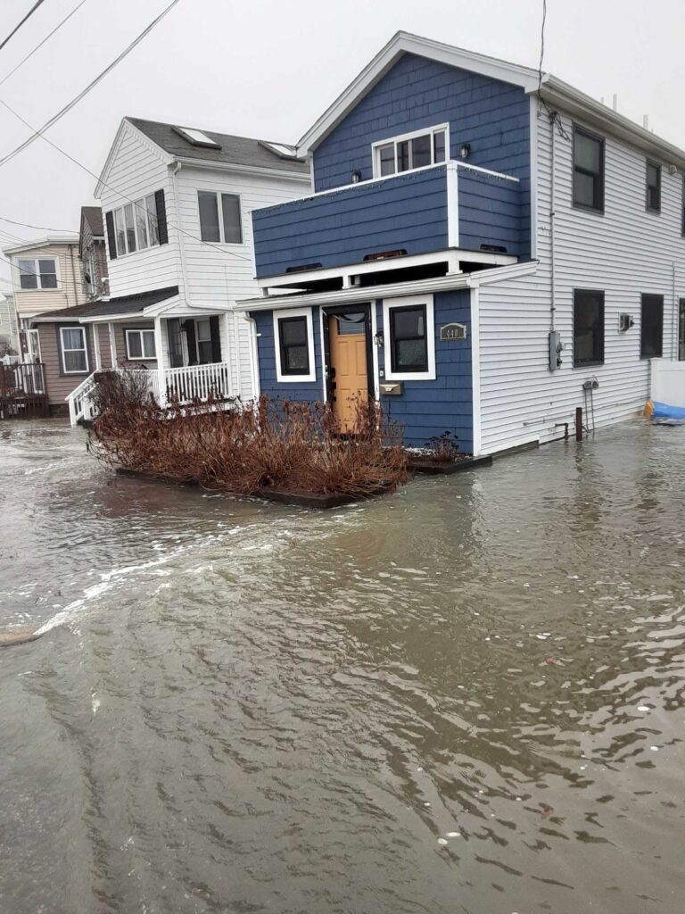 a row of houses on a flooded street (MyCoast AI)