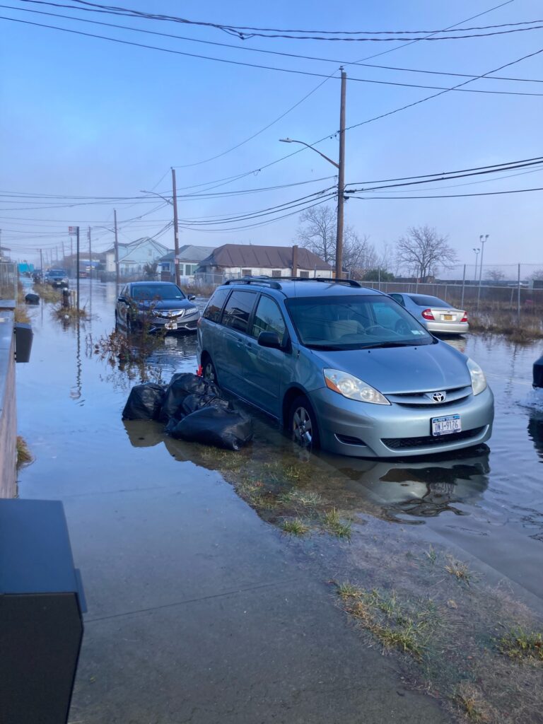 a car on a flooded street (MyCoast AI)
