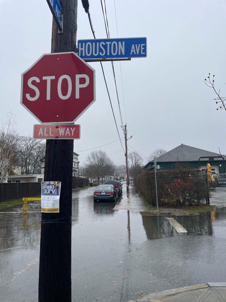 a stop sign on a street corner (MyCoast AI)