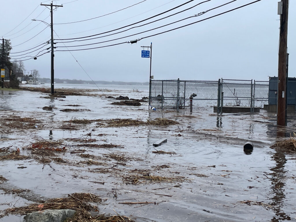 a flooded street with power lines (MyCoast AI)