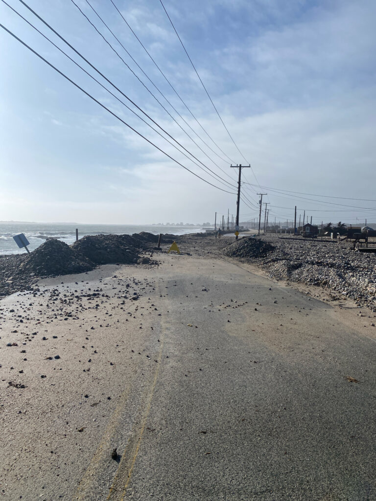 a road with power lines on the side (MyCoast AI)