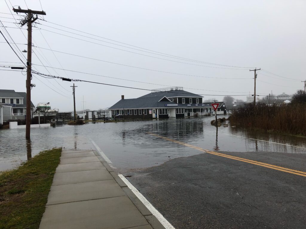 a flooded street with a house (MyCoast AI)