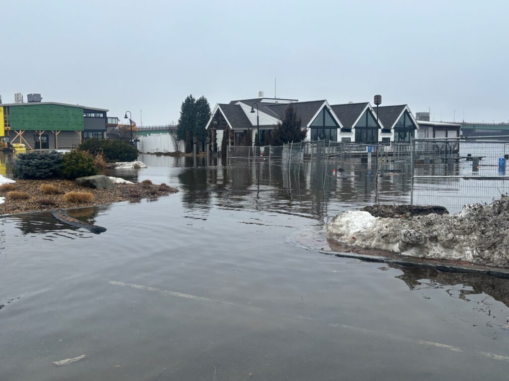 a body of water with houses along it (MyCoast AI)