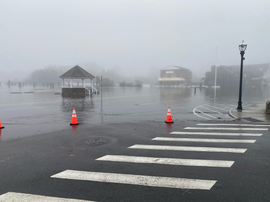 a flooded street with traffic cones (MyCoast AI)
