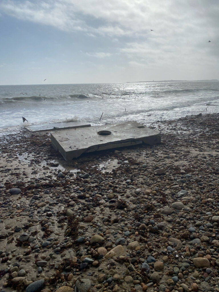a bench on a rocky beach (MyCoast AI)