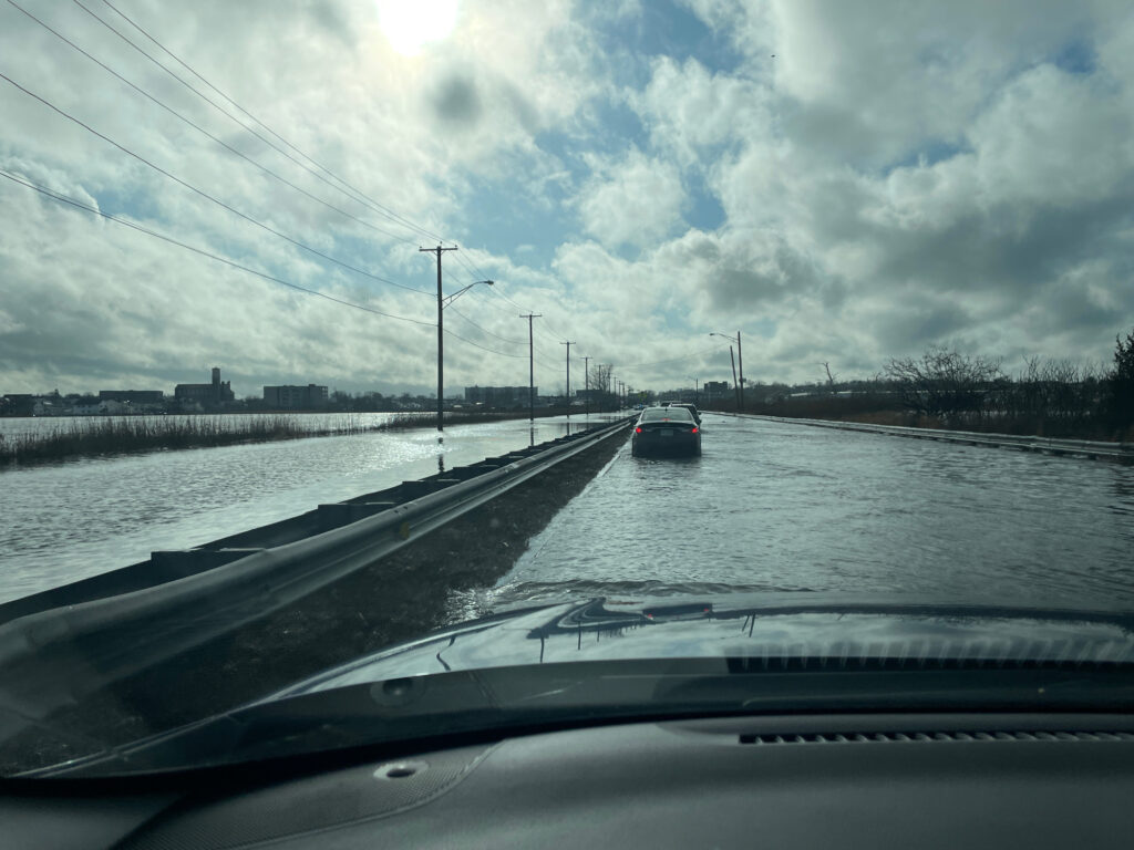 a car driving on a snowy road (MyCoast AI)