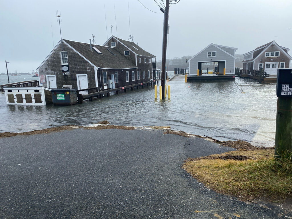 a flooded street with houses (MyCoast AI)