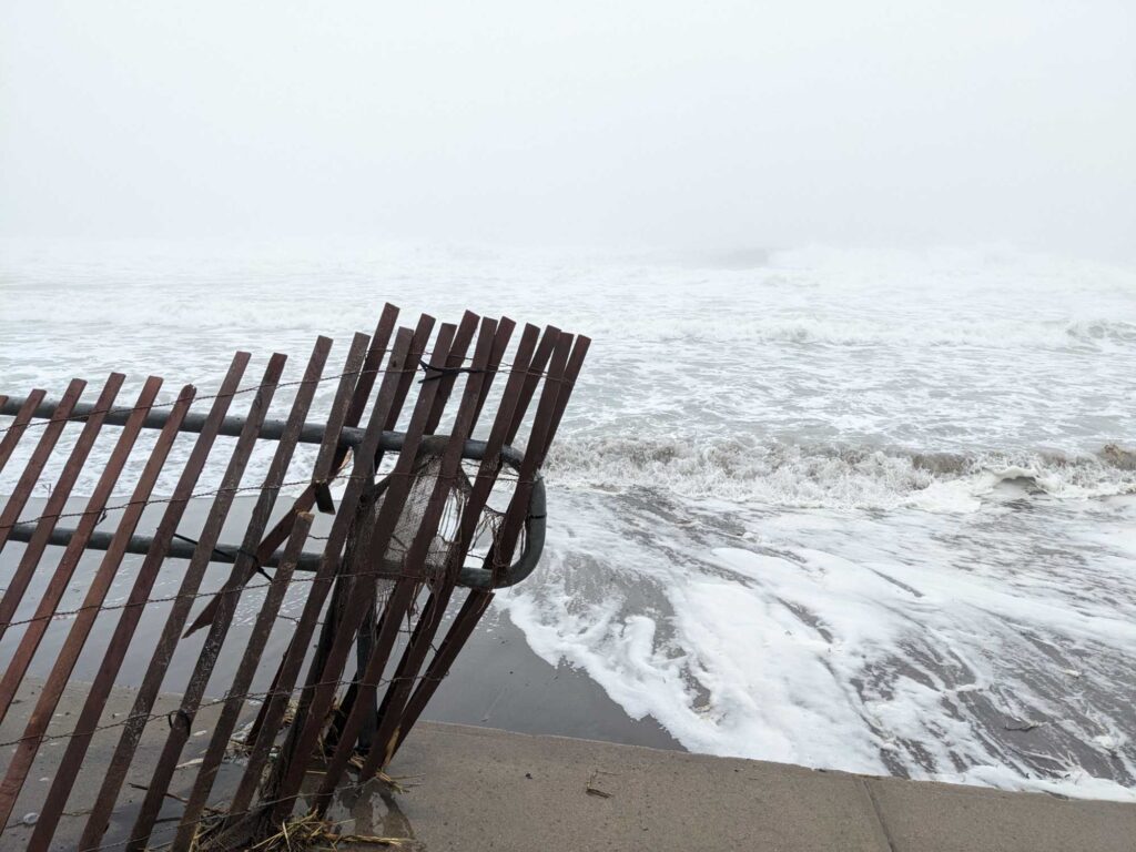 a wooden fence on a beach (MyCoast AI)