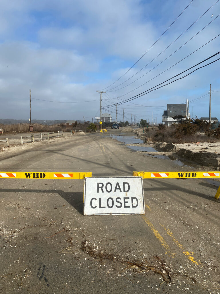a road with a sign on it (MyCoast AI)