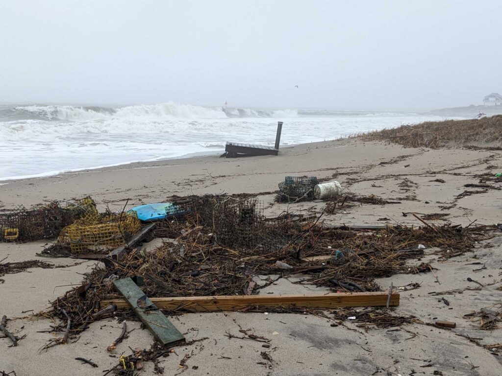 a beach with debris and debris (MyCoast AI)