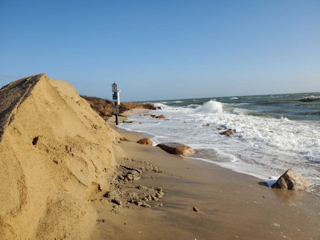 a beach with waves crashing on it (MyCoast AI)