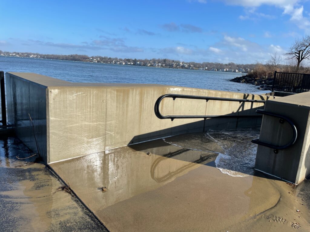 a large dam with a body of water in the background (MyCoast AI)