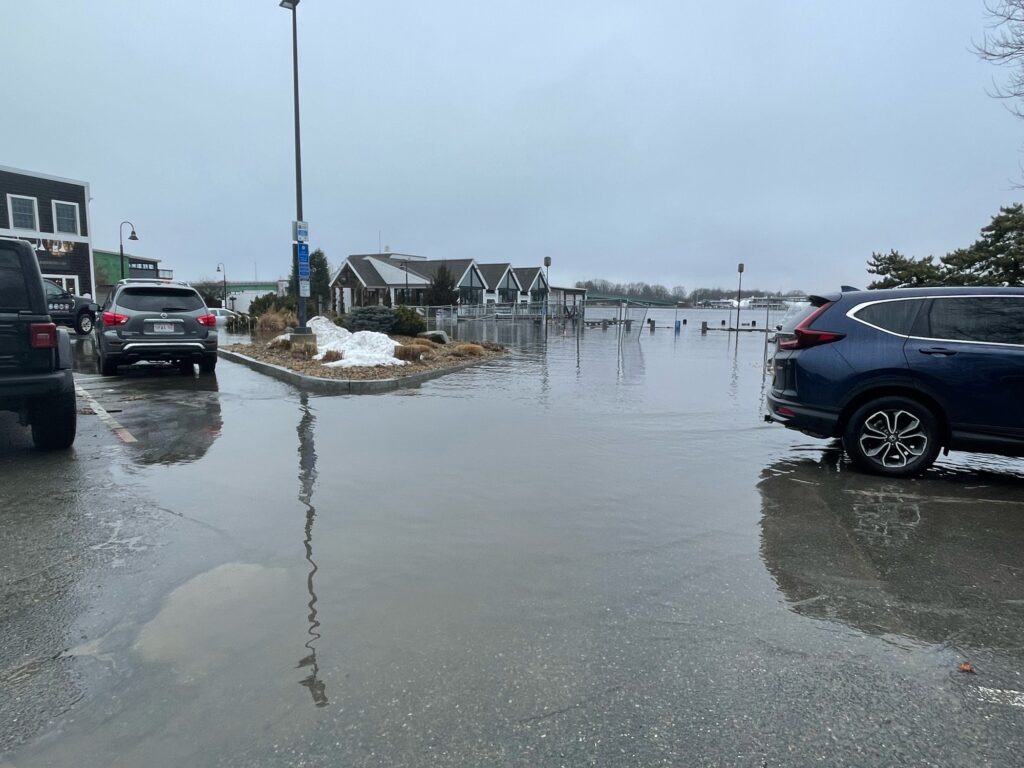 cars parked in a flooded lot (MyCoast AI)