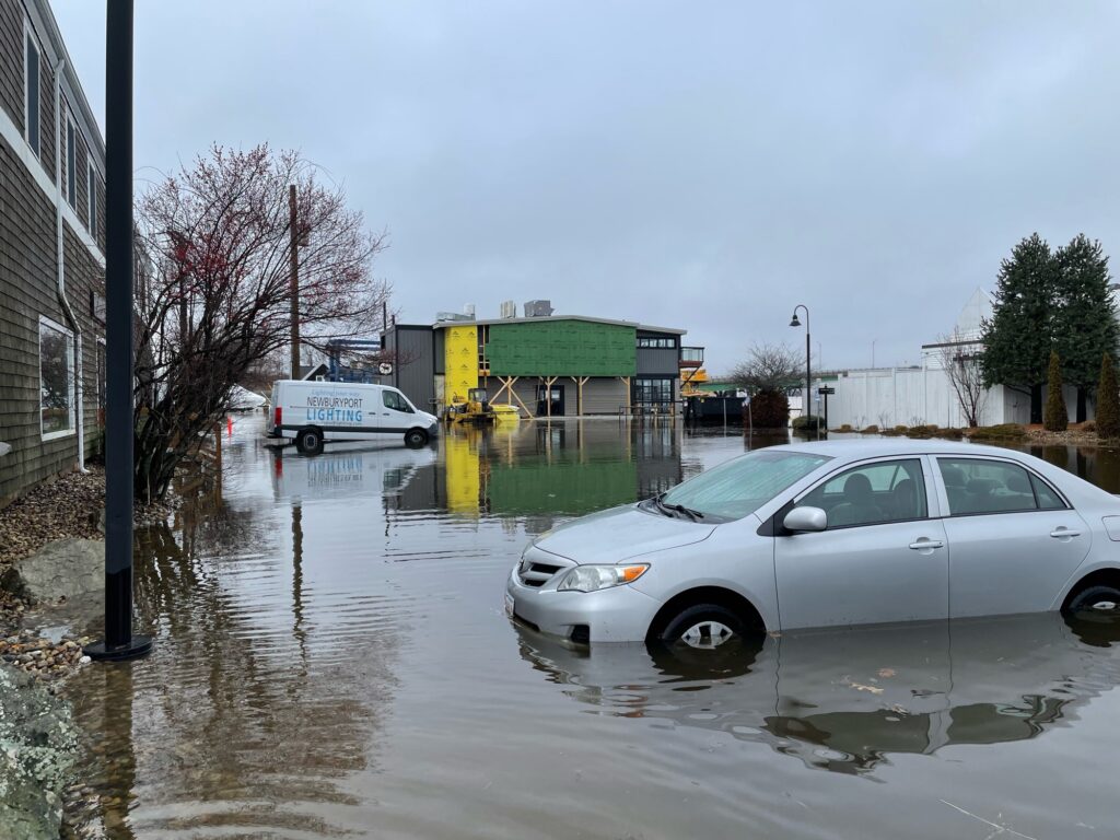 a car parked on a wet street (MyCoast AI)