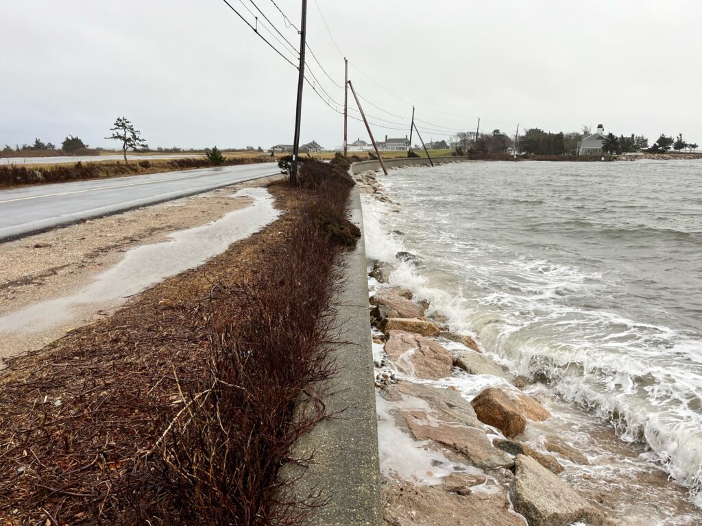 a road next to a body of water (MyCoast AI)
