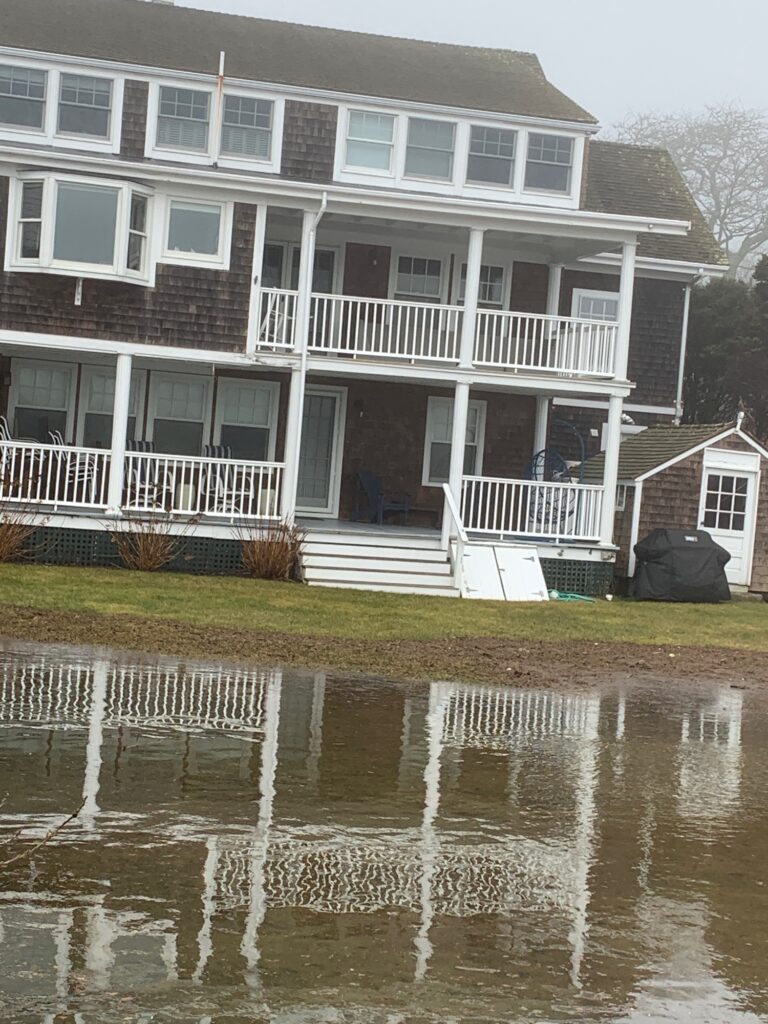 a house with a large front yard (MyCoast AI)