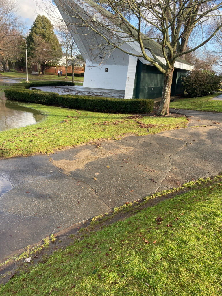 a small building with a small pond (MyCoast AI)