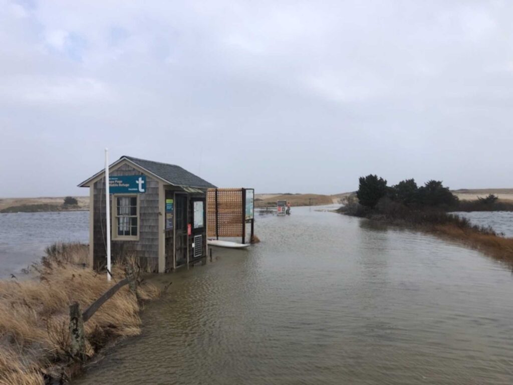 a small shack on a flooded area (MyCoast AI)