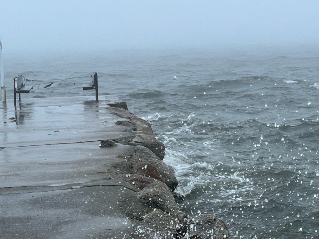 a beach with rocks and a body of water (MyCoast AI)