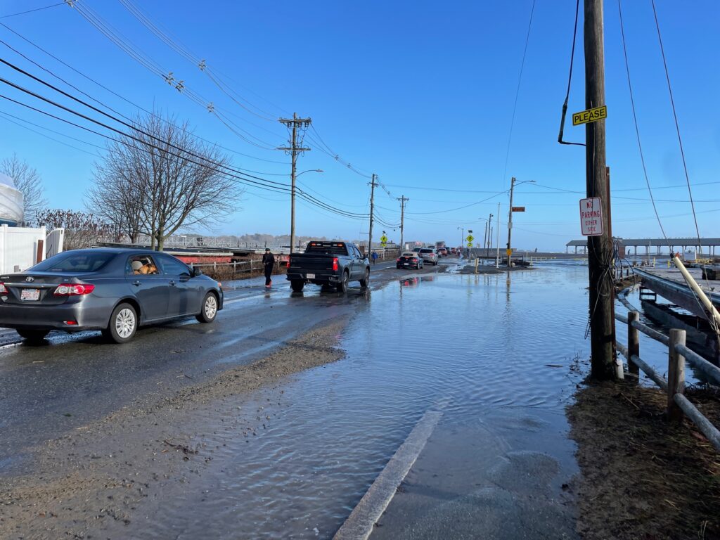 a flooded street with cars (MyCoast AI)