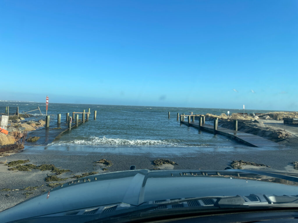 a car parked on a beach (MyCoast AI)