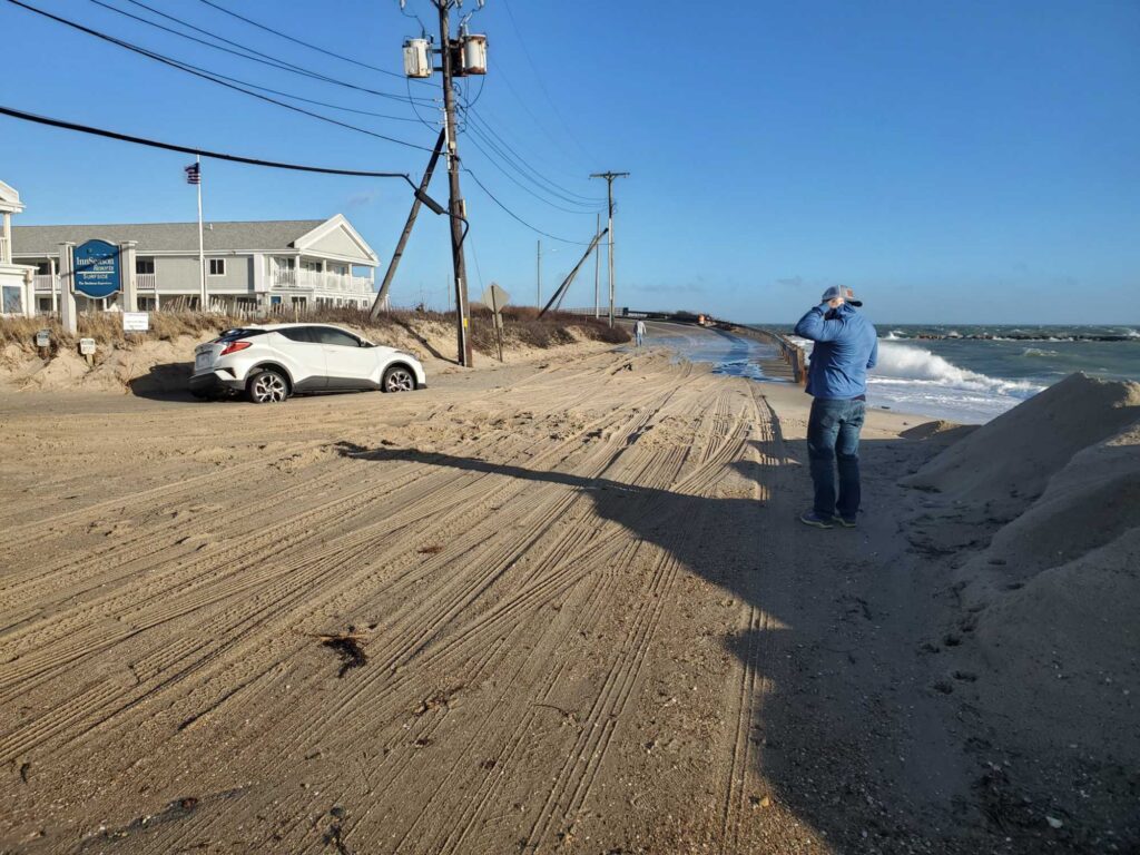 a man standing on a beach (MyCoast AI)