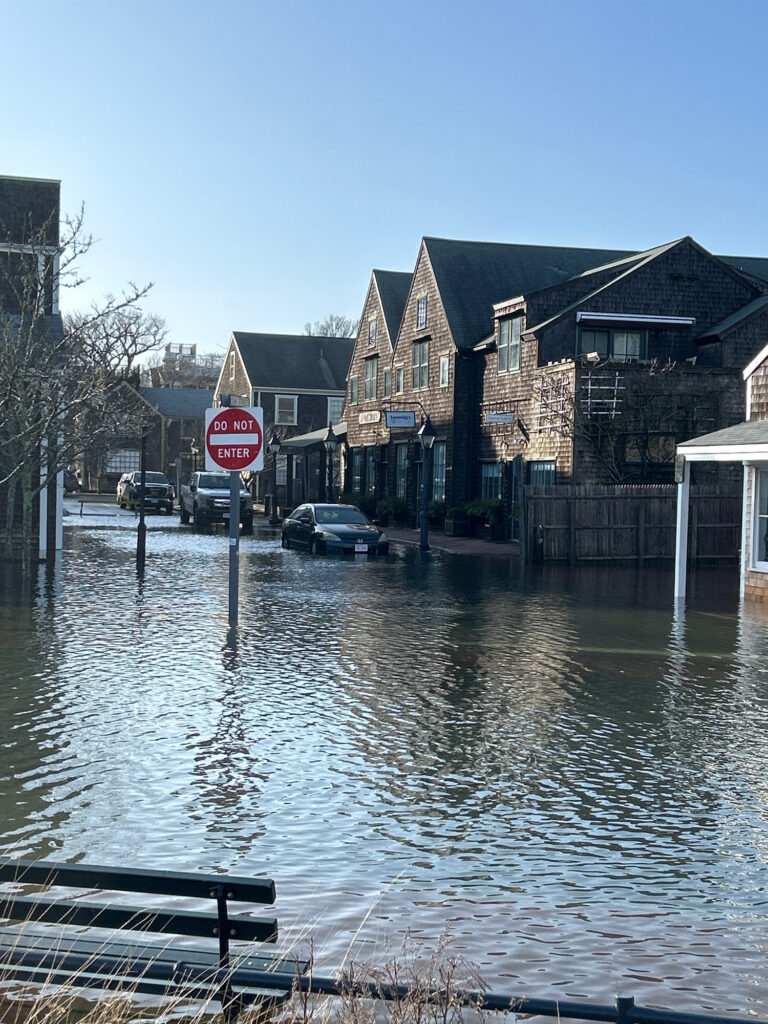 a flooded street with a stop sign (MyCoast AI)