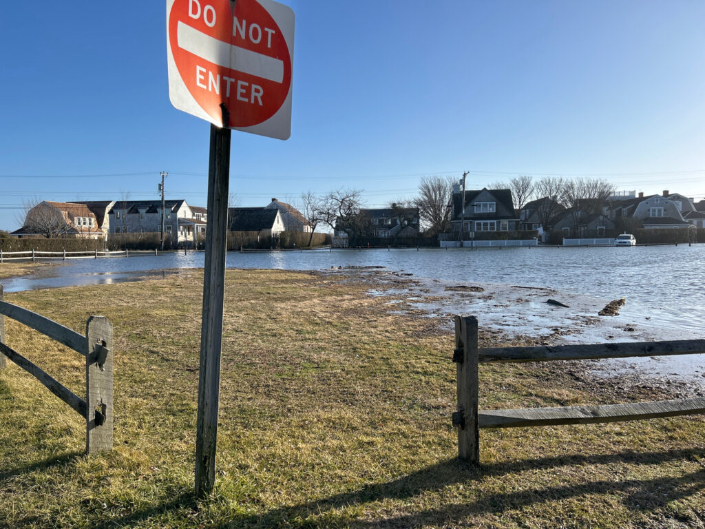 a stop sign on the side of a river (MyCoast AI)
