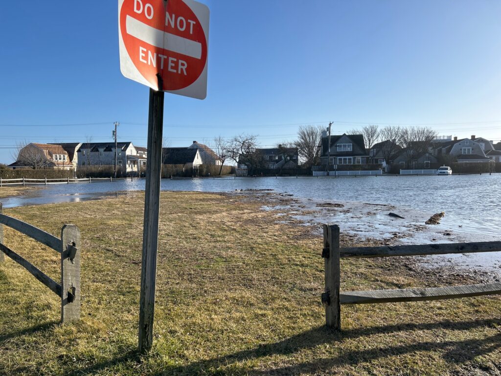a stop sign on the side of a river (MyCoast AI)