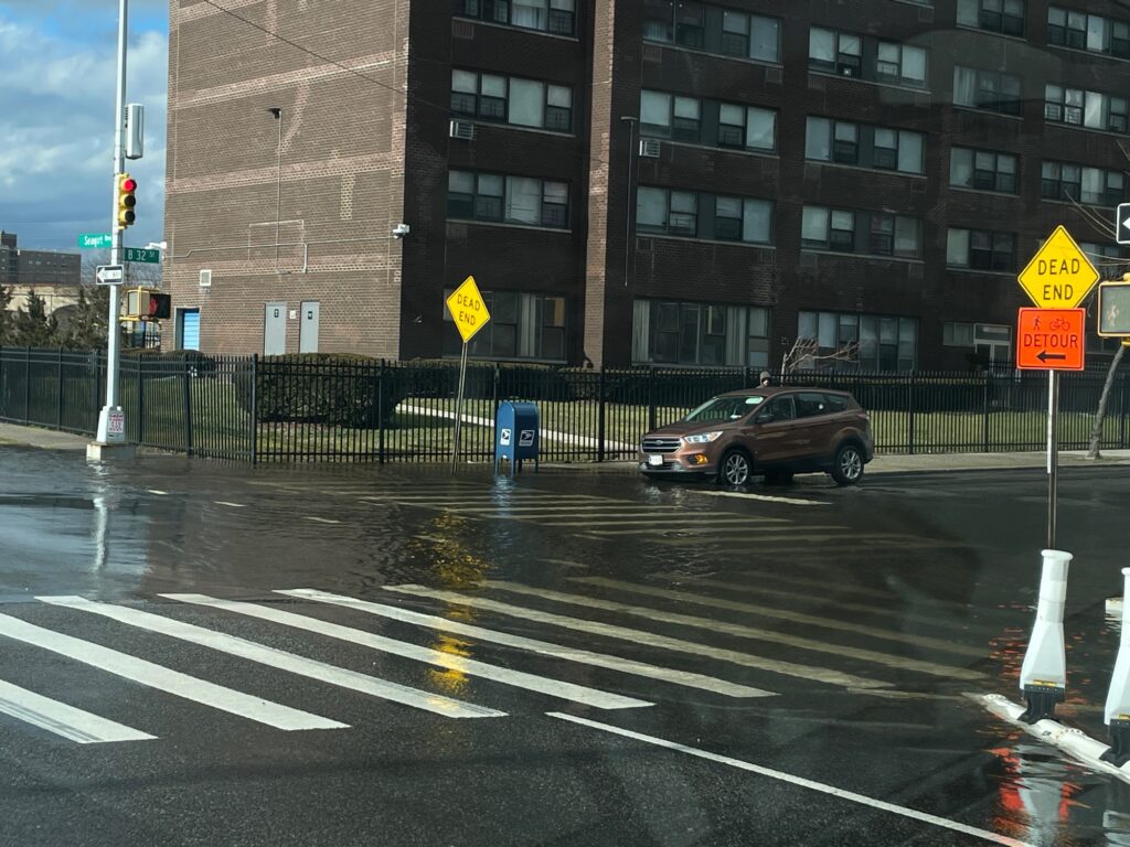 a car driving down a street (MyCoast AI)