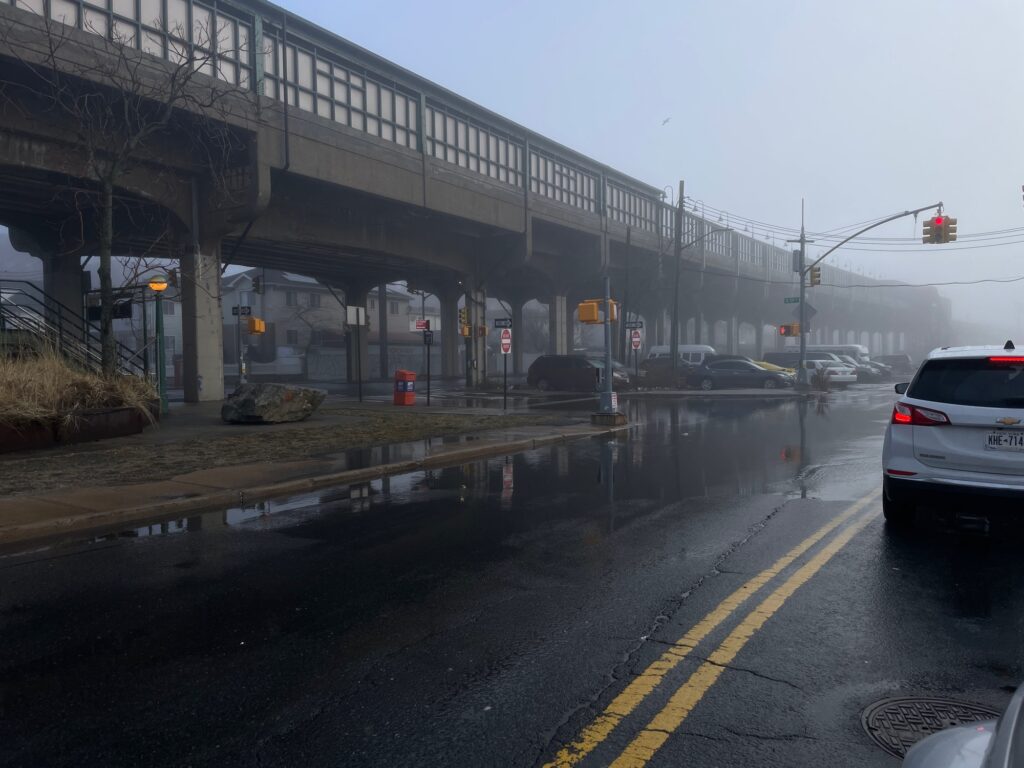 a flooded street with cars (MyCoast AI)