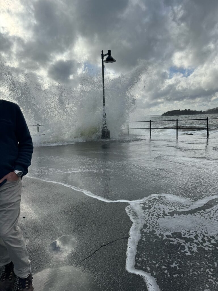 a person standing in a puddle (MyCoast AI)