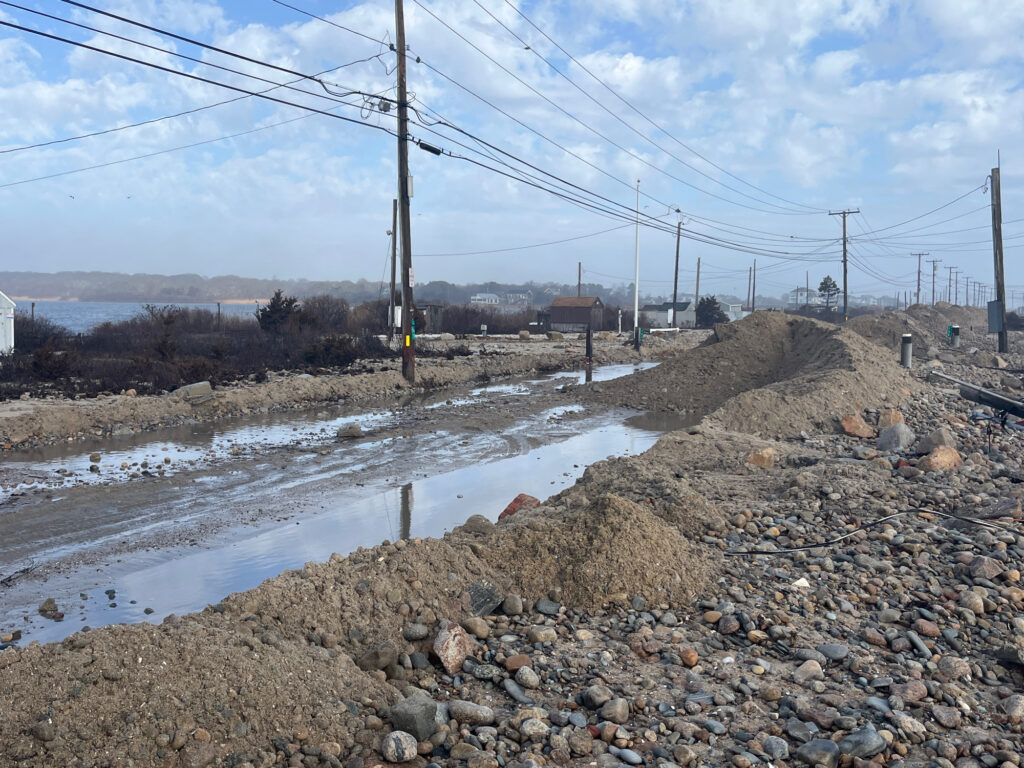 a river with rocks and power lines (MyCoast AI)