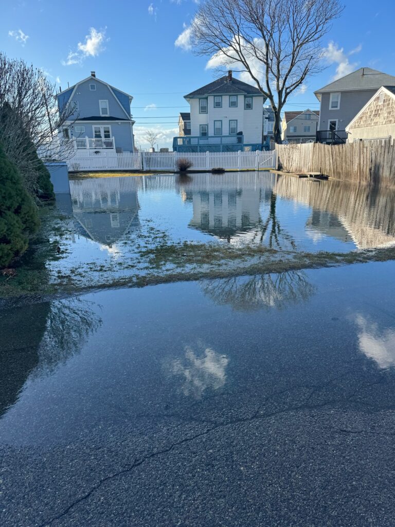a body of water with houses along it (MyCoast AI)