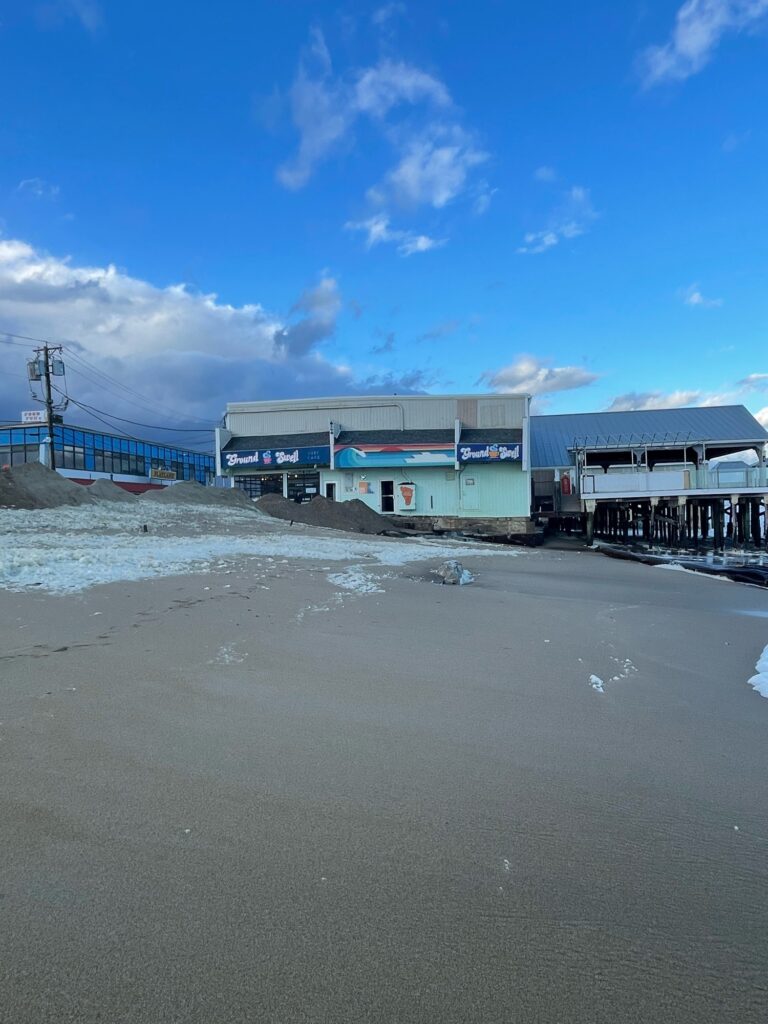 a building with a snowy ground (MyCoast AI)