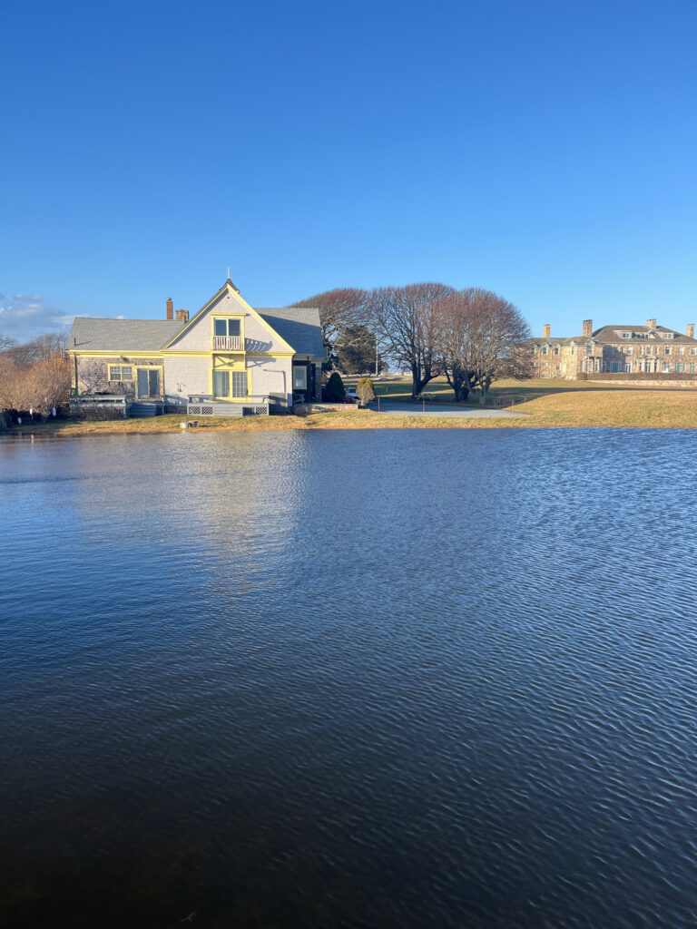 a body of water with houses along it (MyCoast AI)